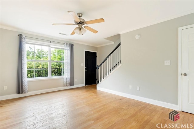 105 Whitehead Rd Unit 17, Athens, GA 30606 - foyer entrance featuring ornamental molding, stairway, light wood-style flooring, and a ceiling fan