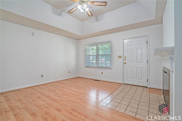 148 Hunters Crossing Rd, Athens, GA 30606 - entrance foyer featuring light wood finished floors, a ceiling fan, and a raised ceiling