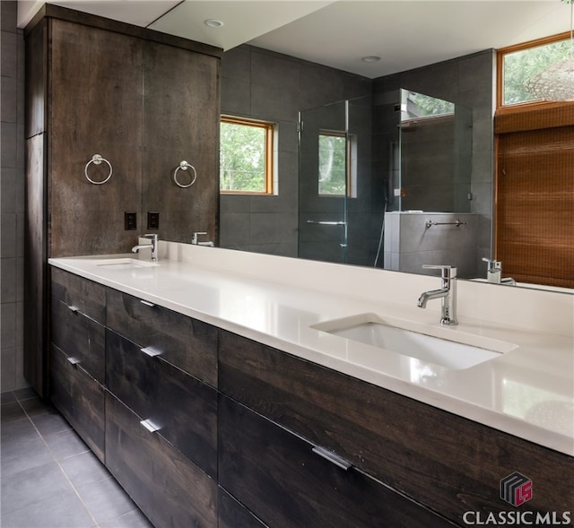 497 W Rutherford St, Athens, GA 30606 - bathroom with double vanity, tile walls, and tile patterned floors