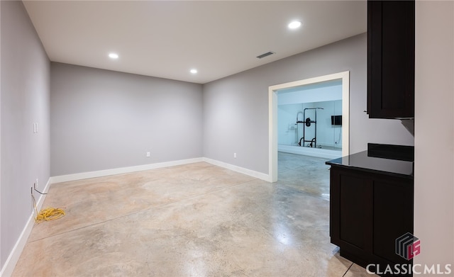 497 W Rutherford St, Athens, GA 30606 - unfurnished room with concrete flooring and recessed lighting