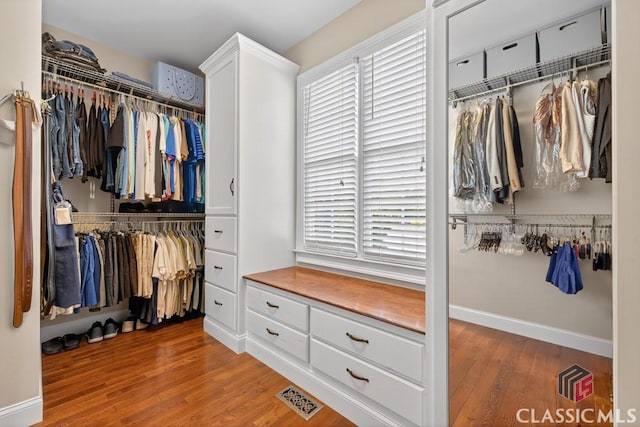 1232 Everton Pl, Cumming, GA 30041 - spacious closet featuring wood finished floors