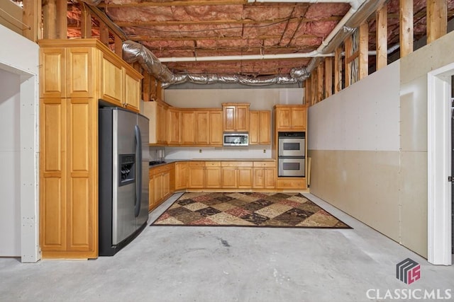 1232 Everton Pl, Cumming, GA 30041 - kitchen featuring stainless steel appliances, unfinished concrete floors, and light brown cabinetry