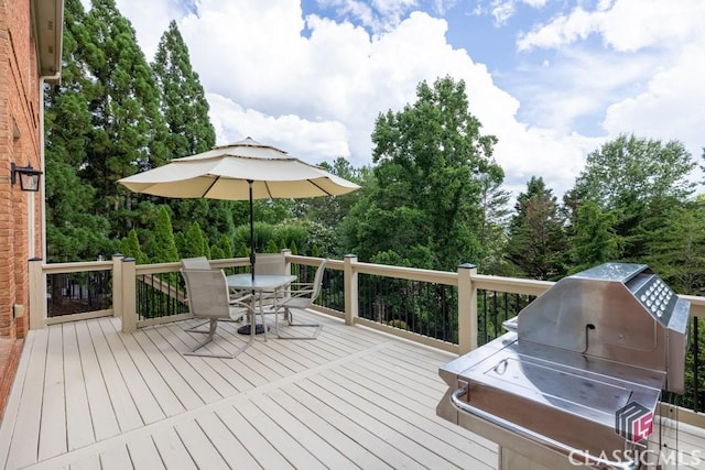 1232 Everton Pl, Cumming, GA 30041 - wooden terrace featuring a grill and outdoor dining area