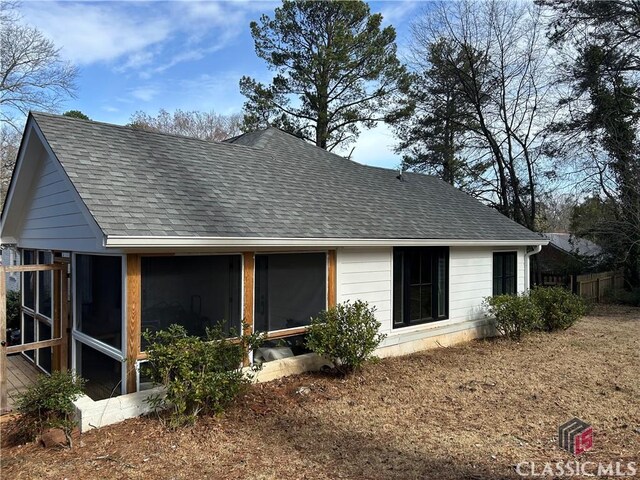 525 King Ave, Athens, GA 30606 - view of side of property featuring roof with shingles and a sunroom