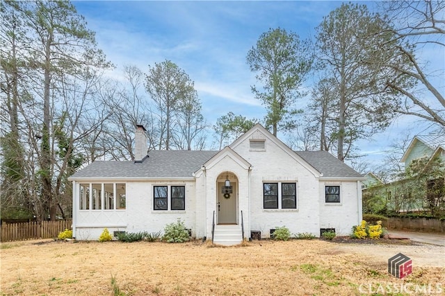 525 King Ave, Athens, GA 30606 - view of front of home featuring a chimney, brick siding, a shingled roof, and entry steps