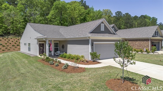 1260 Starboard Way, Greensboro, GA 30642 - single story home with an attached garage, a front lawn, concrete driveway, and roof with shingles