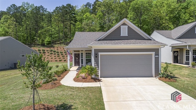 1260 Starboard Way, Greensboro, GA 30642 - view of front of home with a front yard, a garage, driveway, and a shingled roof