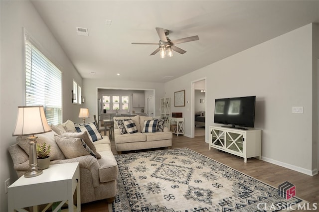 1260 Starboard Way, Greensboro, GA 30642 - living room featuring a ceiling fan and wood finished floors