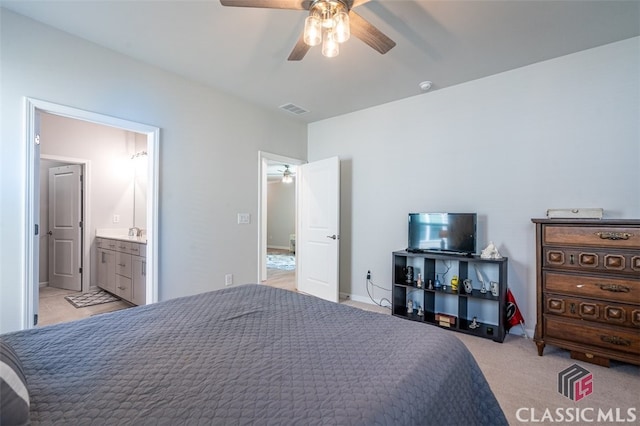 1260 Starboard Way, Greensboro, GA 30642 - bedroom with a ceiling fan and connected bathroom