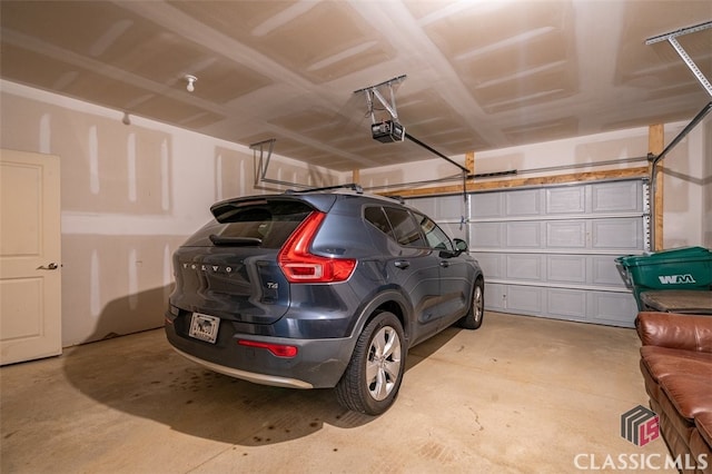 1260 Starboard Way, Greensboro, GA 30642 - garage with a garage door opener