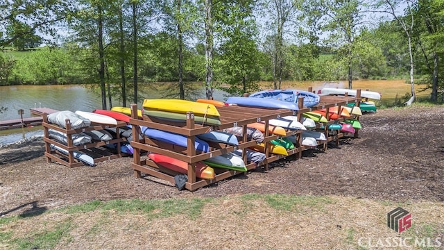 1260 Starboard Way, Greensboro, GA 30642 - dock area with a water view and view of wooded area