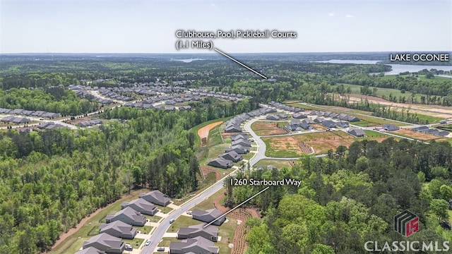 1260 Starboard Way, Greensboro, GA 30642 - aerial perspective of suburban area with a forest