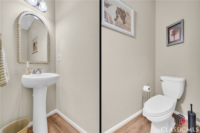 263 Turtle Creek Dr, Winder, GA 30680 - half bathroom featuring wood finished floors and toilet