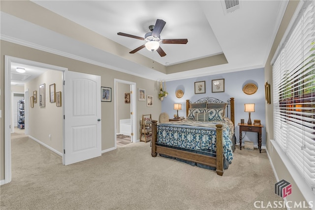 263 Turtle Creek Dr, Winder, GA 30680 - bedroom featuring carpet flooring, ensuite bathroom, a ceiling fan, a raised ceiling, and crown molding