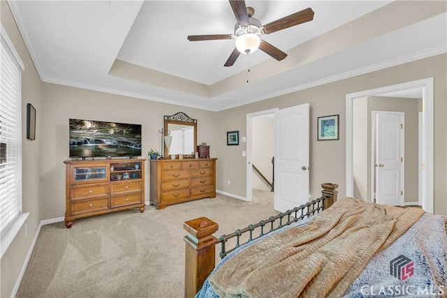 263 Turtle Creek Dr, Winder, GA 30680 - bedroom with light colored carpet, a tray ceiling, a ceiling fan, and crown molding