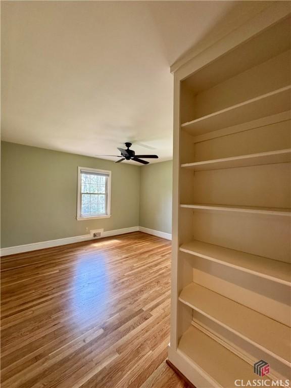 270 Riverhill Dr, Athens, GA 30606 - unfurnished room featuring wood finished floors and ceiling fan