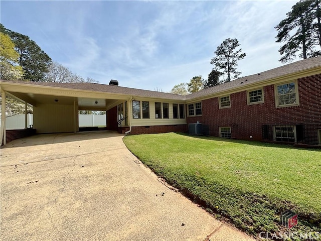 270 Riverhill Dr, Athens, GA 30606 - rear view of property featuring an attached carport, driveway, and a yard