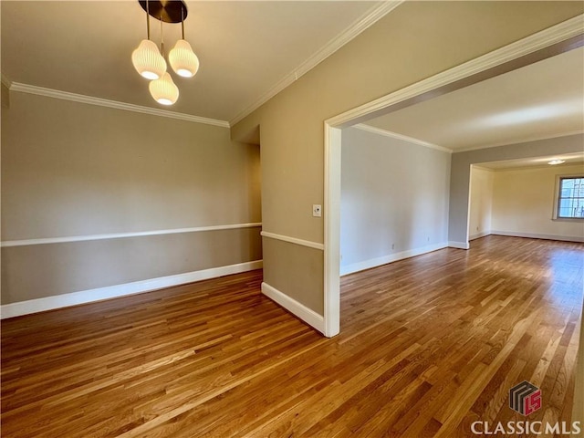 270 Riverhill Dr, Athens, GA 30606 - spare room with wood finished floors, crown molding, and a chandelier