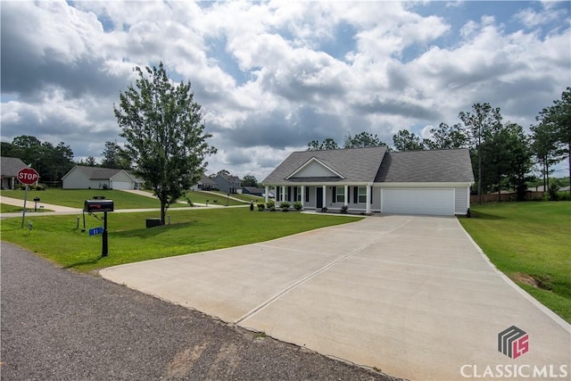 11 Rachel, Hartwell, GA 30643 - view of front facade featuring an attached garage, a front lawn, driveway, and covered porch