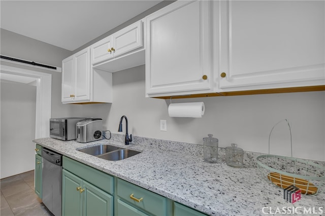 1376 Hancock Ave W, Athens, GA 30606 - kitchen with appliances with stainless steel finishes, white cabinets, and light stone countertops