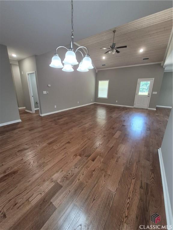 1090 Fox Glen Dr, Watkinsville, GA 30677 - unfurnished room with a chandelier, wood finished floors, ceiling fan, ornamental molding, and vaulted ceiling