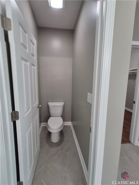 1090 Fox Glen Dr, Watkinsville, GA 30677 - bathroom with toilet and tile patterned flooring