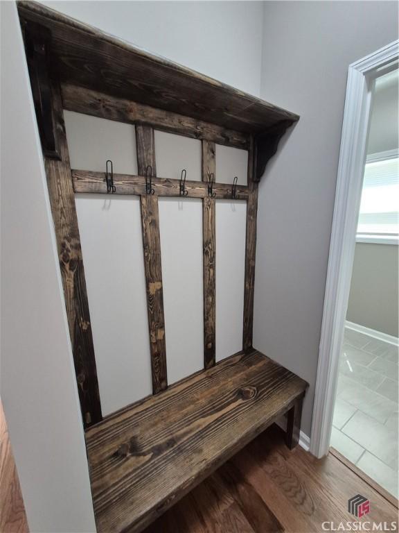 1090 Fox Glen Dr, Watkinsville, GA 30677 - mudroom with baseboards and wood finished floors