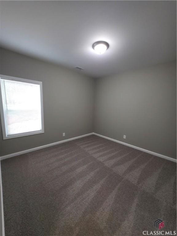 366 Washington Dr, Athens, GA 30601 - empty room featuring baseboards and dark colored carpet