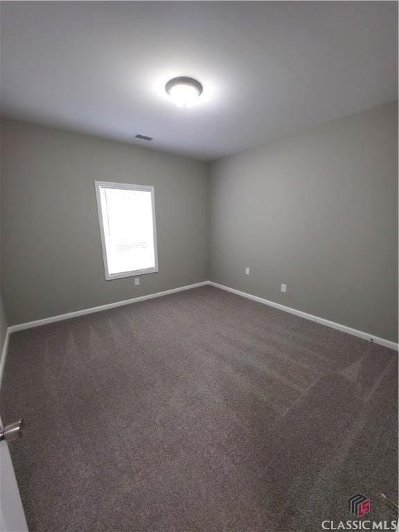 366 Washington Dr, Athens, GA 30601 - unfurnished room with baseboards and dark carpet
