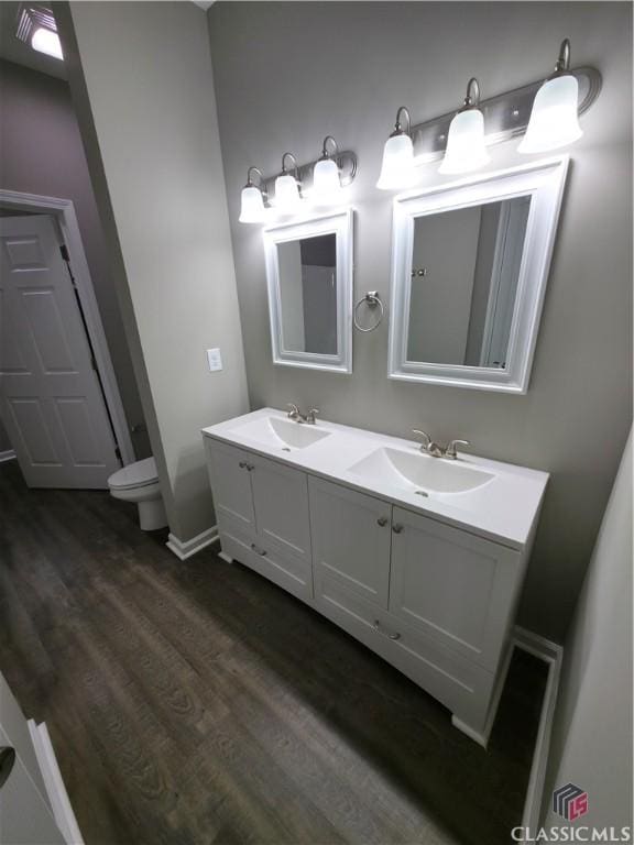 366 Washington Dr, Athens, GA 30601 - bathroom with wood finished floors and double vanity