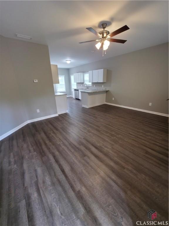 366 Washington Dr, Athens, GA 30601 - unfurnished living room with ceiling fan and dark wood finished floors
