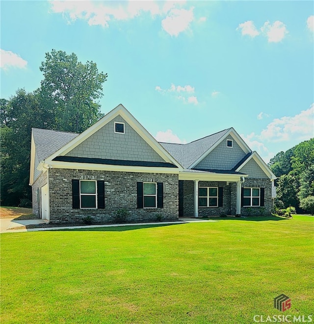 1070 Lane Creek Ter, Bishop, GA 30621 - craftsman house with a front yard, brick siding, and a garage