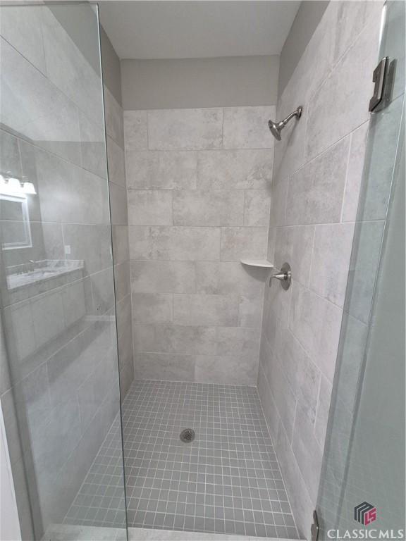 1070 Lane Creek Ter, Bishop, GA 30621 - bathroom featuring a shower stall