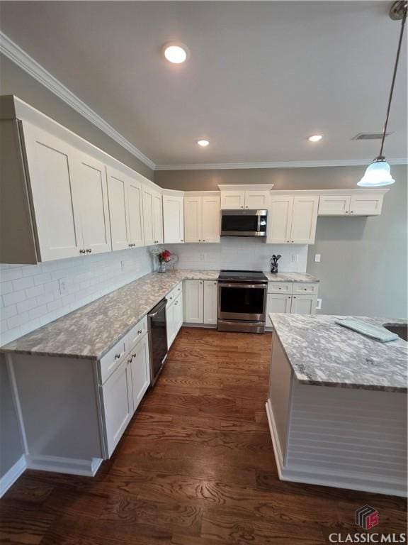 1070 Lane Creek Ter, Bishop, GA 30621 - kitchen with stainless steel appliances, ornamental molding, decorative backsplash, light stone countertops, and white cabinetry