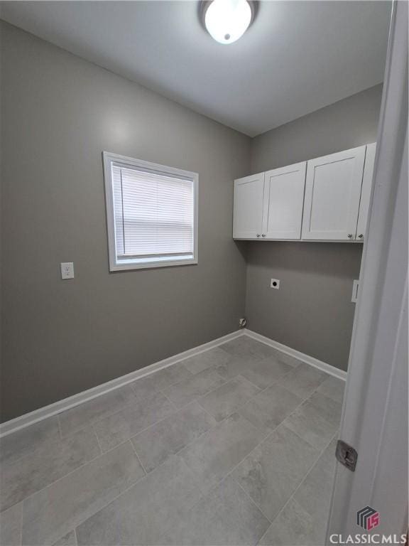 1070 Lane Creek Ter, Bishop, GA 30621 - washroom with cabinet space and electric dryer hookup