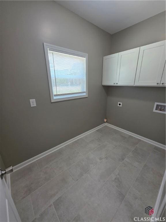 1070 Lane Creek Ter, Bishop, GA 30621 - laundry area with cabinet space and washer hookup