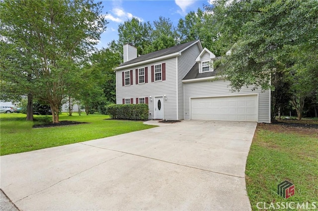 255 Twin Creek Shrs, Athens, GA 30605 - colonial home featuring concrete driveway, a front yard, an attached garage, and a chimney