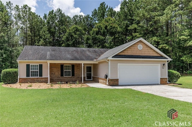 94 Pinewood Cir, Colbert, GA 30628 - view of front of home featuring brick siding, an attached garage, a front lawn, and concrete driveway