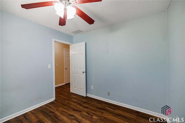 94 Pinewood Cir, Colbert, GA 30628 - unfurnished room featuring dark wood finished floors, a textured ceiling, and a ceiling fan