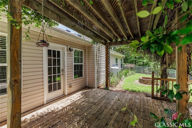 94 Pinewood Cir, Colbert, GA 30628 - wooden terrace featuring a fire pit