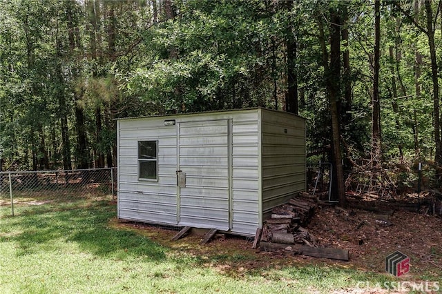 94 Pinewood Cir, Colbert, GA 30628 - view of shed featuring a wooded view