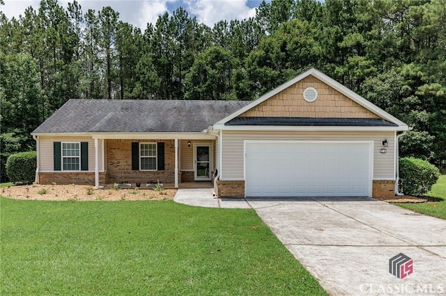 94 Pinewood Cir, Colbert, GA 30628 - view of front of house with brick siding, driveway, and a front yard