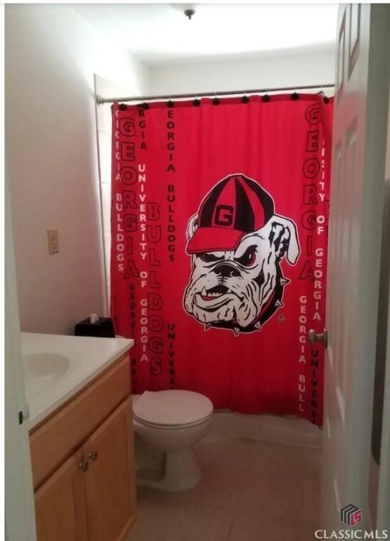 250 Little St Unit C210, Athens, GA 30605 - full bath featuring vanity, tile patterned floors, and a shower with shower curtain
