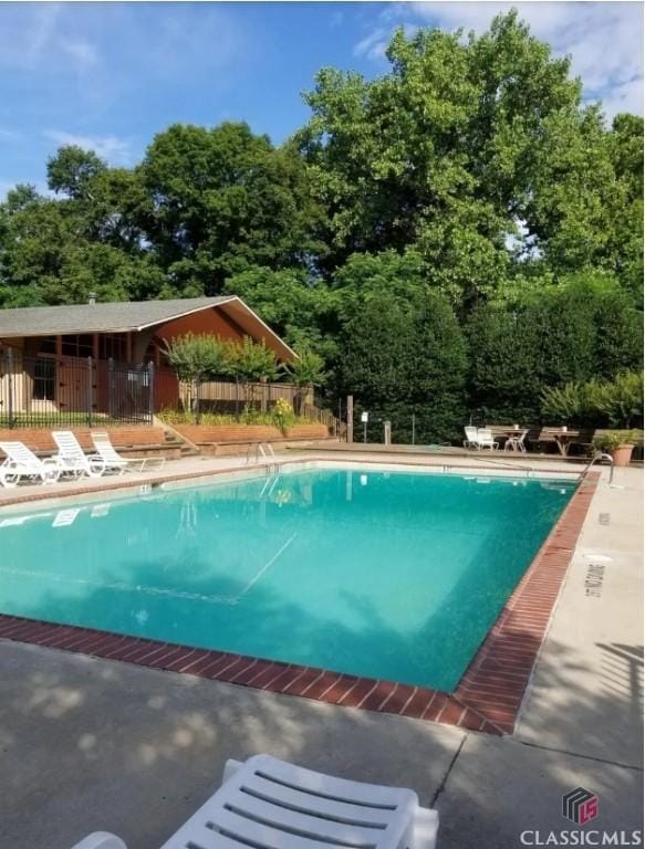 250 Little St Unit C210, Athens, GA 30605 - community pool featuring view of wooded area
