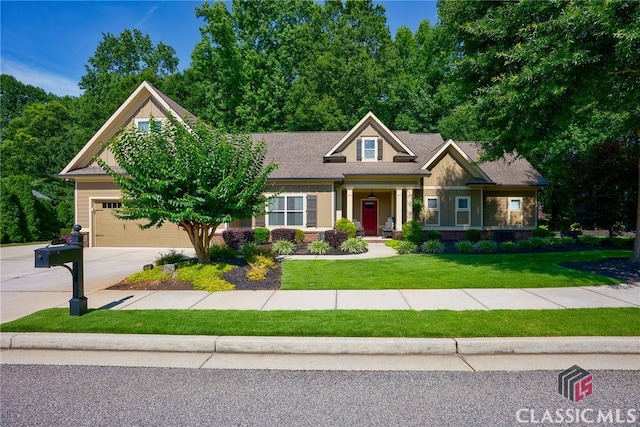 1640 Madison Ct, Bogart, GA 30622 - craftsman inspired home with driveway, a garage, and a front yard