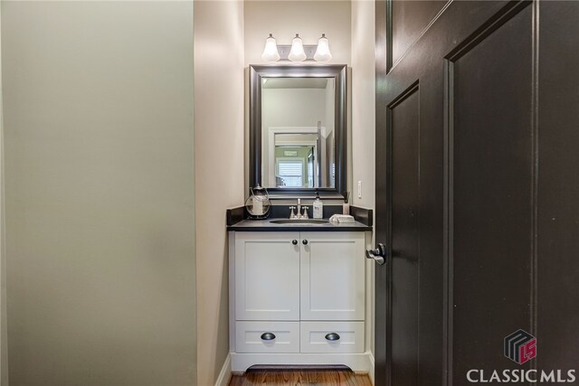 1640 Madison Ct, Bogart, GA 30622 - bathroom featuring vanity and wood finished floors
