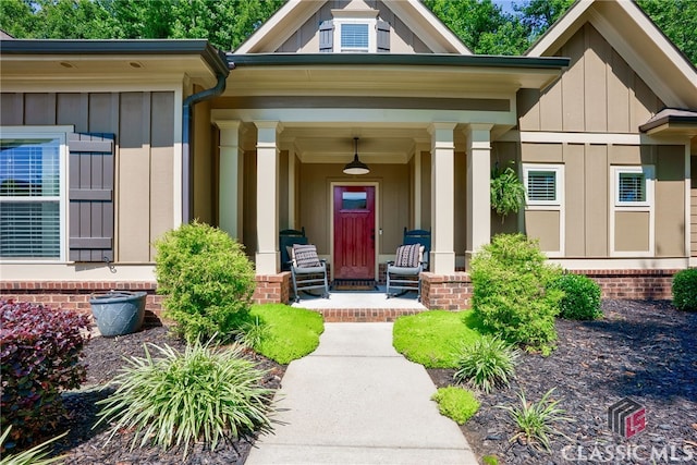 1640 Madison Ct, Bogart, GA 30622 - property entrance with a porch and board and batten siding