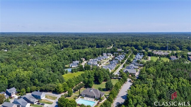1640 Madison Ct, Bogart, GA 30622 - drone / aerial view of a heavily wooded area and a pool