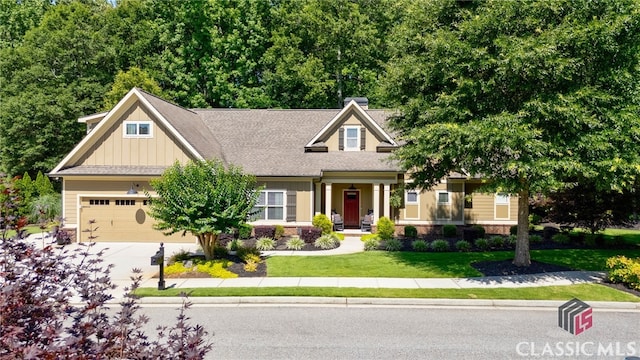1640 Madison Ct, Bogart, GA 30622 - craftsman-style house with a chimney, board and batten siding, concrete driveway, a front yard, and stone siding