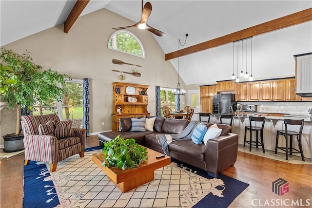 2061 Sugar Creek Trl, Buckhead, GA 30625 - living room with high vaulted ceiling, light wood-type flooring, ceiling fan, beam ceiling, and a chandelier